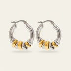 Seraphina Treasures Veyora two-tone hoop earrings with gold and silver looped charms. Lightweight metal.