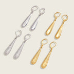 Seraphina Treasures gold and silver water drop dangle earrings. Two styles: polished teardrop and textured elongated drop.