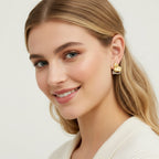 Seraphina Treasures Zaria heart earrings in gold and silver finish. Sculptural, two-tone design.