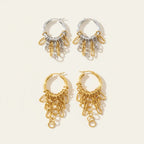 Seraphina Treasures Zephyriax gold and silver tone hoop earrings with cascading chain link tassels.