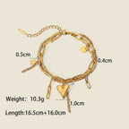Seraphina Treasures Zorya gold-tone stainless steel bracelet with layered chains, heart and star charms.