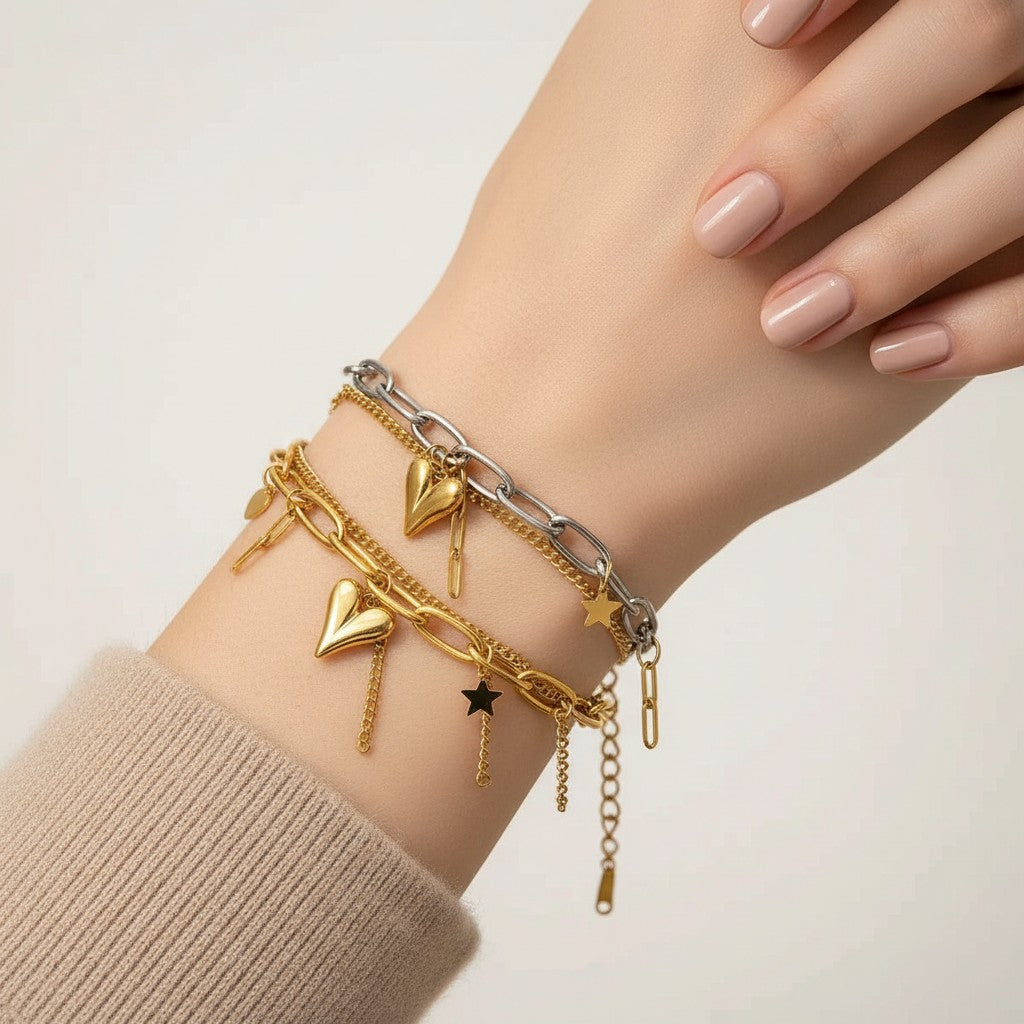 Seraphina Treasures Zorya two-layer gold and silver tone bracelet with heart and star charms.