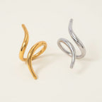 Seraphina Treasures Zyra ring in gold and silver, modern geometric spiral design.