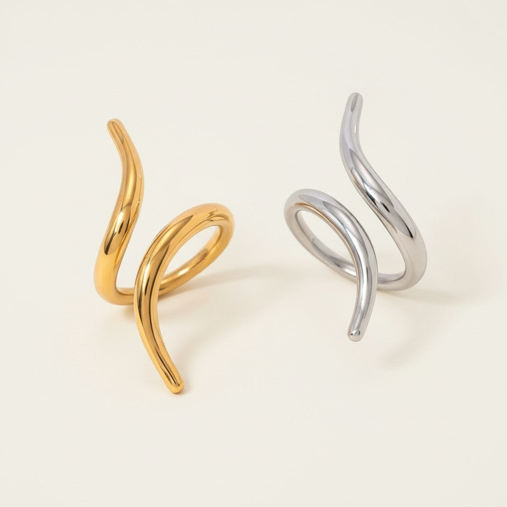 Seraphina Treasures Zyra ring in gold and silver, modern geometric spiral design.